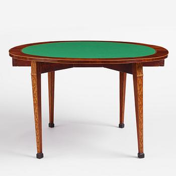 A Russian Louis XVI mahogany and birch parquetry demi-lune games table, late 18th century.