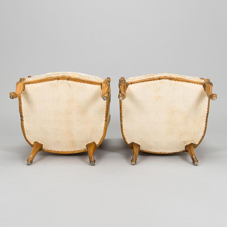 A pair of mid-20th-century French armchairs in Roccoco style.