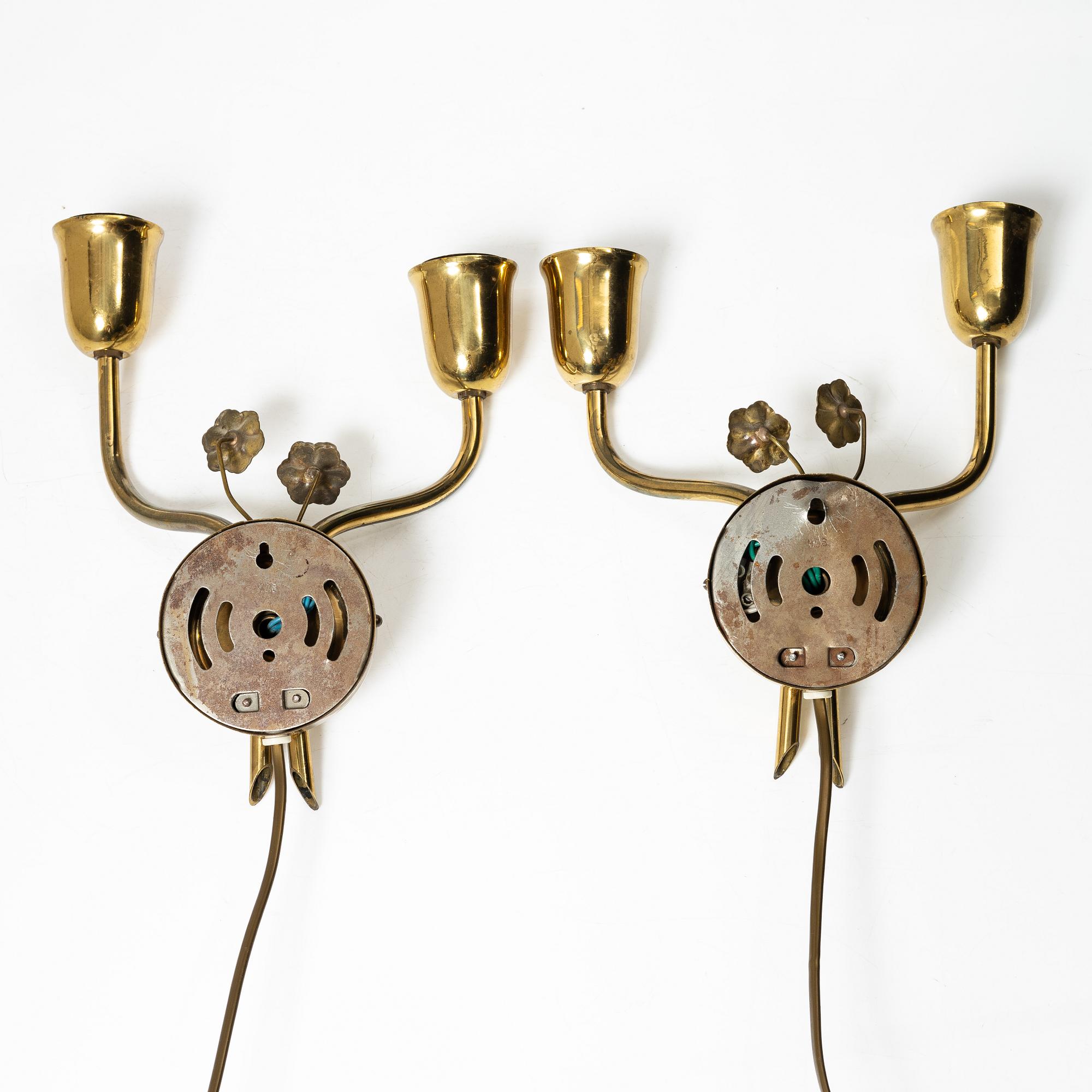 A pair of Scandinavian Modern wall lamps, 1940s.