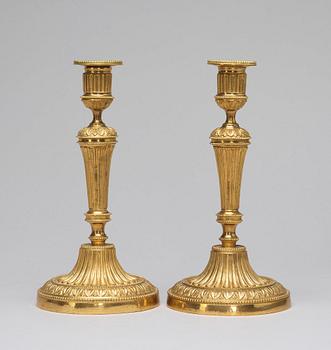 A pair of candlesticks, Louis XVI-style, circa 1900.