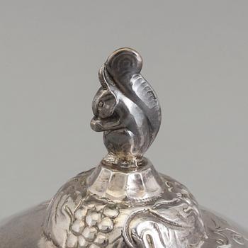 A Swedish Art Nouveau lidded silver box topped with a chipmunk, maker's mark Carl Sandberg, Ystad, 1919.