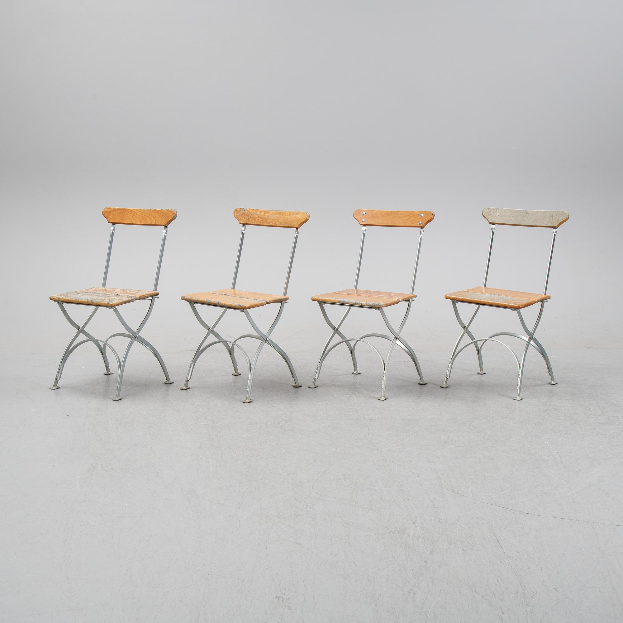 A set of four chairs and one table, Grythyttan, late 20th century.