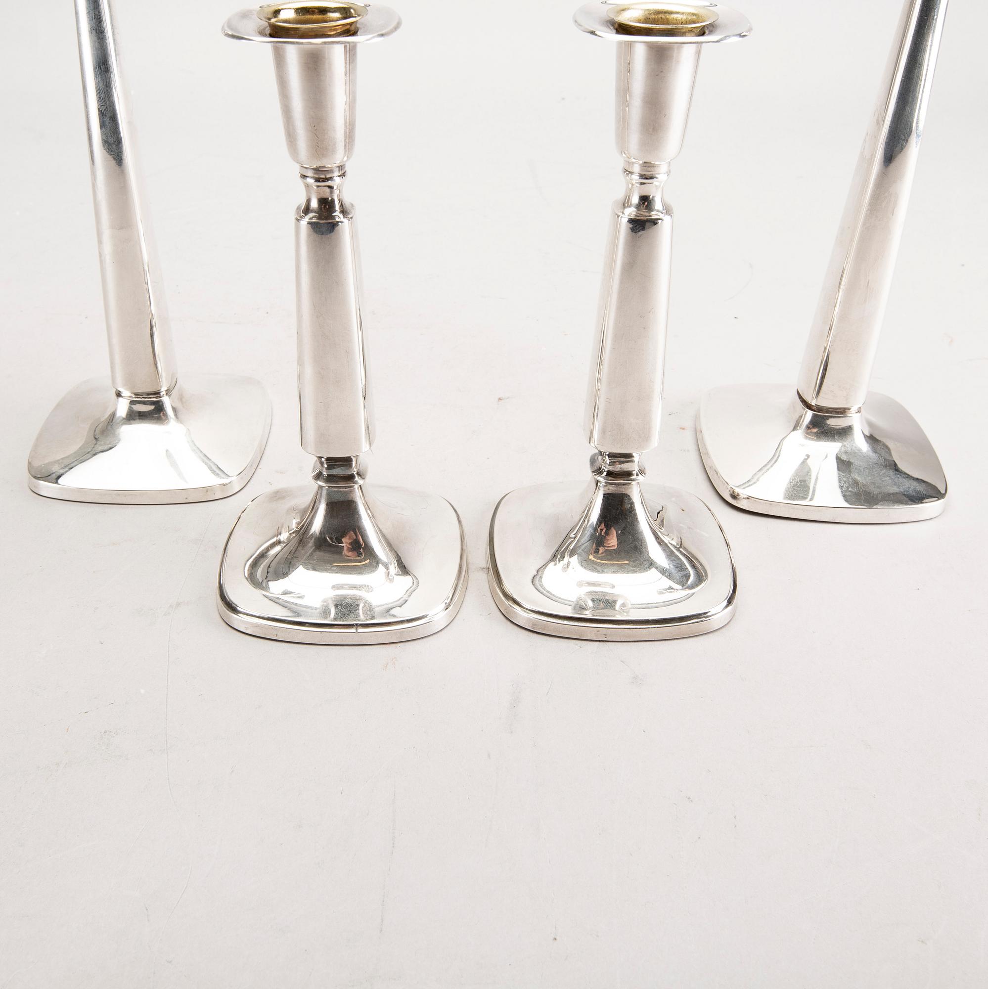 A Swedish 20th century set of two pairs of candlesticks mark of T Eldh Göteborg 1968-70.