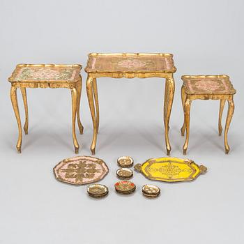 An Italian, mid-20th-century nesting table, two trays, and coasters for bottles and glasses, 18 pieces.