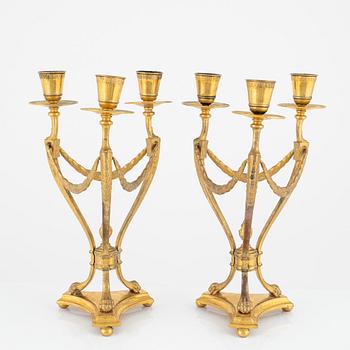 A pair of gilt candelabra, GAB, Stockholm, around the year 1900.
