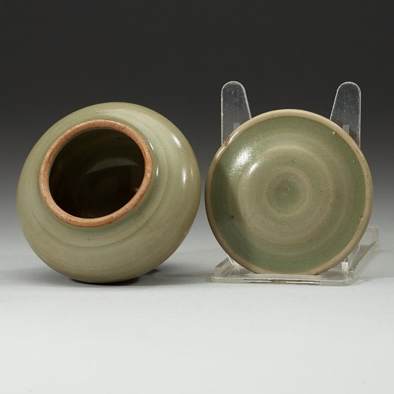 A celadon miniature jar with cover, Ming Dynasty (1368-1644).