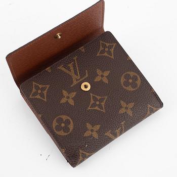 Louis Vuitton, makeup bag and wallet.