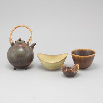 a stoneware teapot and three bowls for Rörstrand.