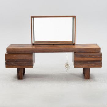 A rosewood veneered dressing table and ottoman, 1960's/70's.