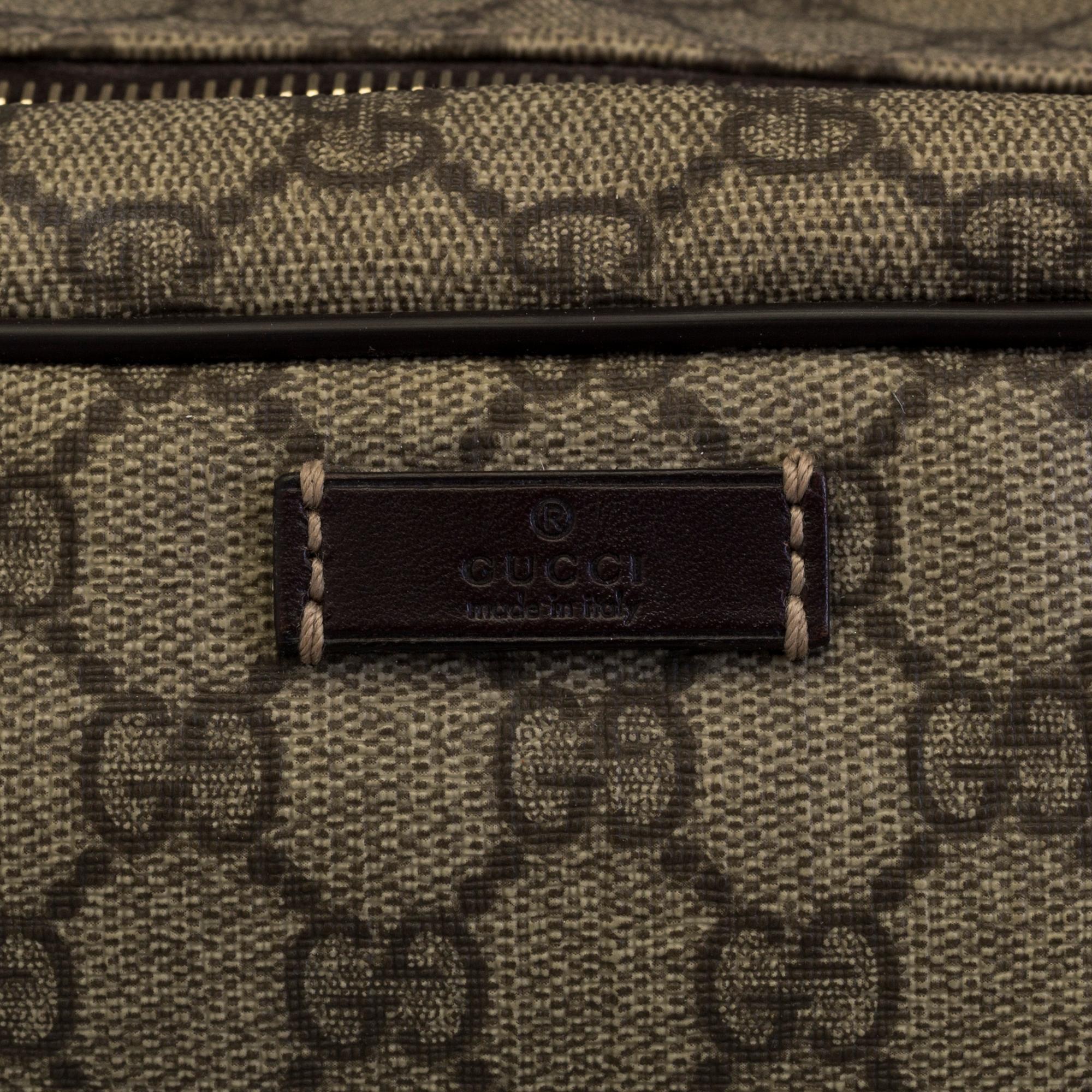 GUCCI, a monogram beauty bag.