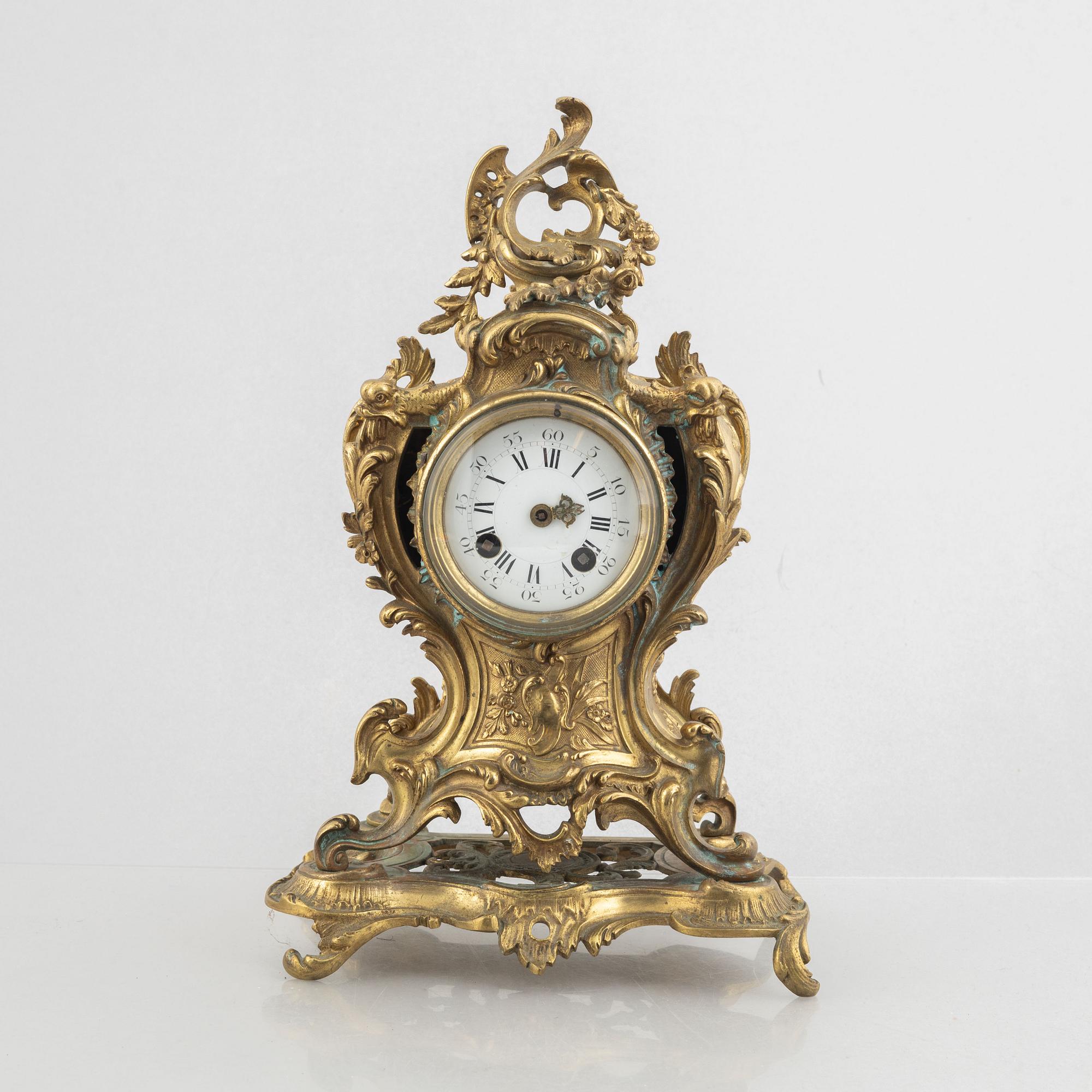A Rococo Revival mantel clock, late 19th Century.