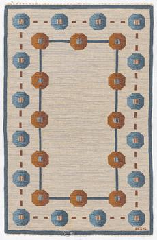 A flat weave carpet by Anna-Greta Sjöqvist c 223 x 144 cm, signed AGS.