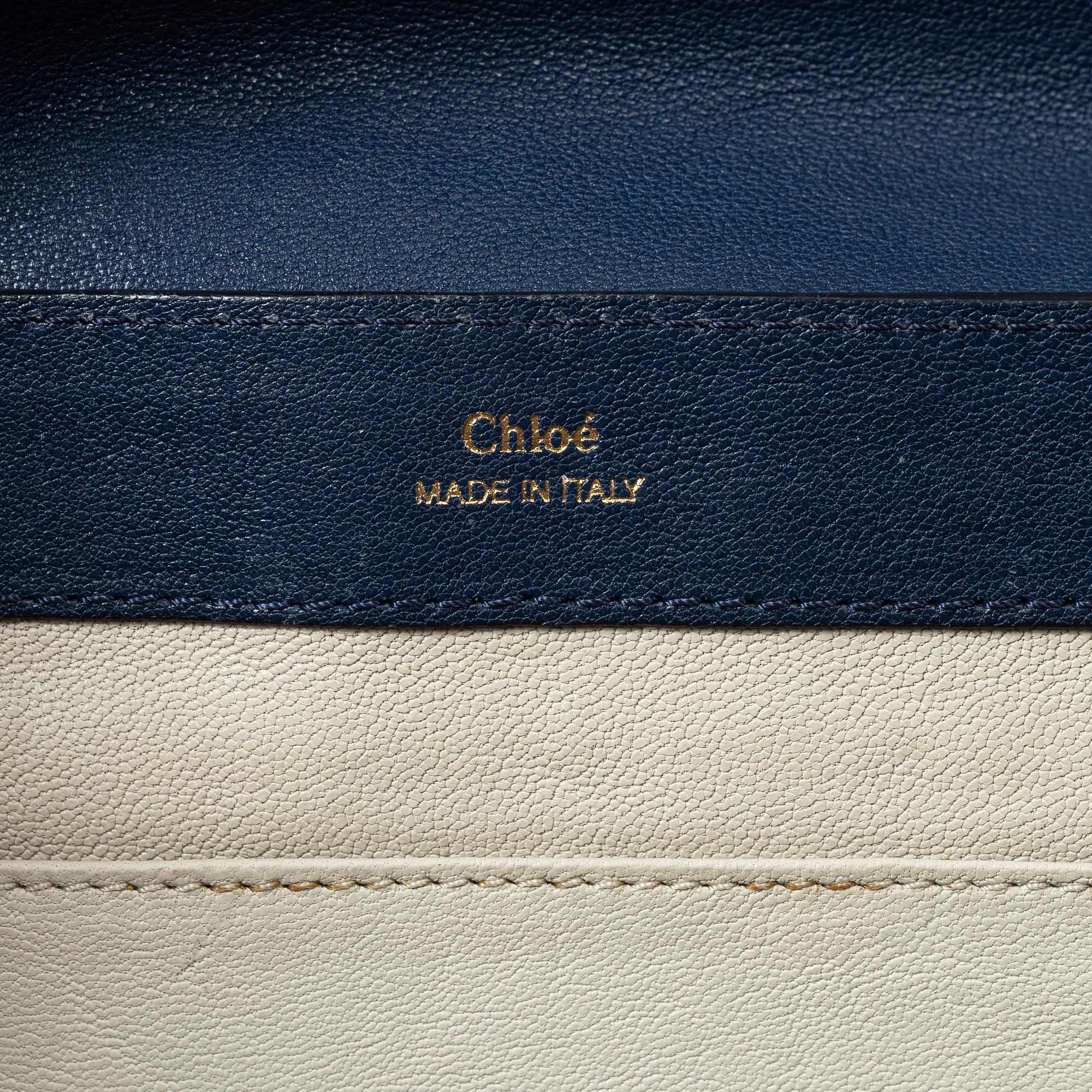Chloé, a blue leather bag.
