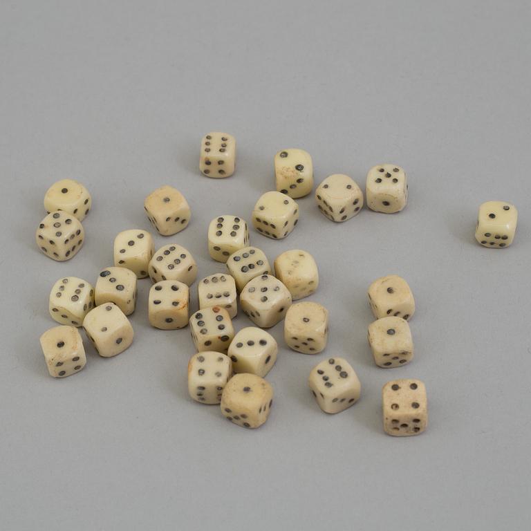 A COLLECTION OF 30 STONE MINIATURE DICE, 19th century.