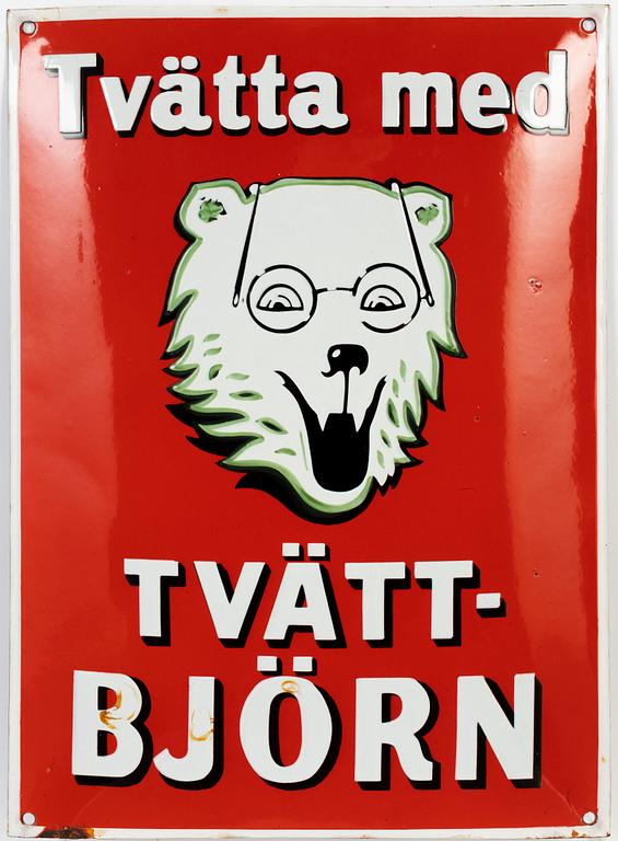 A 'Tvätta med tvättbjörn' advertising sign, first half of the 20th Century.
