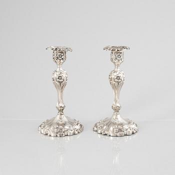 A Pair of Swedish Rococo Revival Silver Candlesticks, mark of Gustaf Möllenborg, Stockholm 1865.