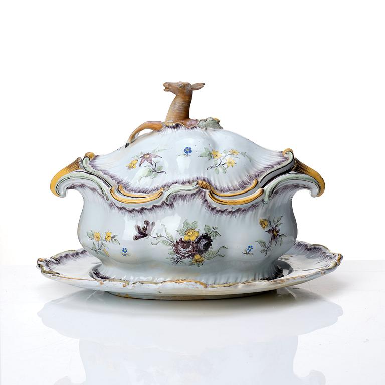 A Swedish Rörstrand faience tureen with cover and stand, 18th Century.