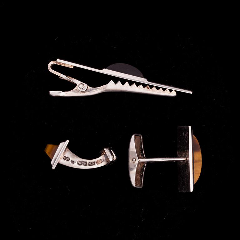 MANSCHETTKNAPPAR och SLIPSNÅL, silver samt tigeröga, Helsingfors 1964.