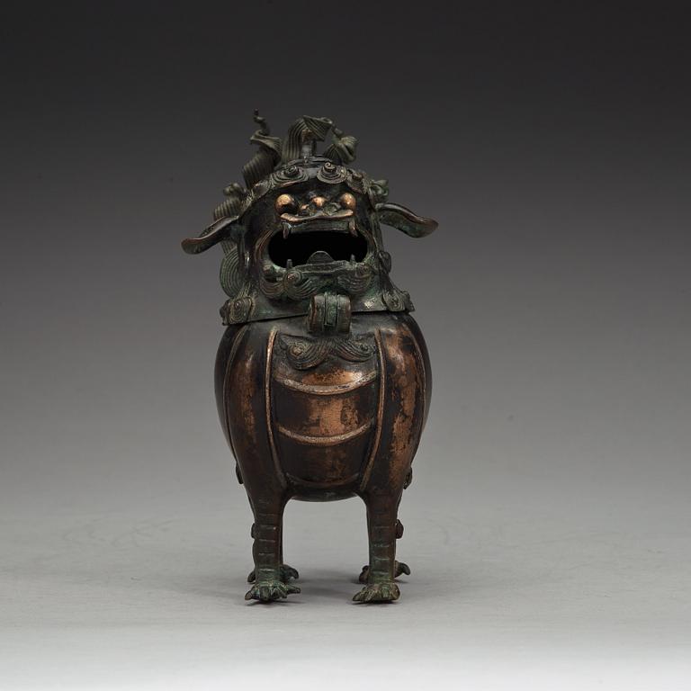 A bronze censer in the shape of a buddhist lion, Qing dynasty (1644-1912).