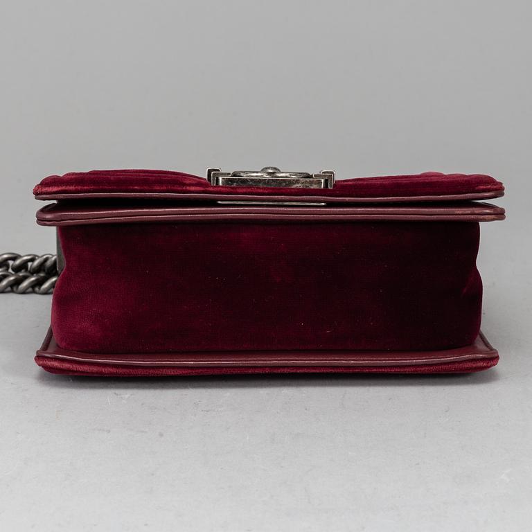 CHANEL, a burgundy quilted velvet 'Small Boy Bag'.