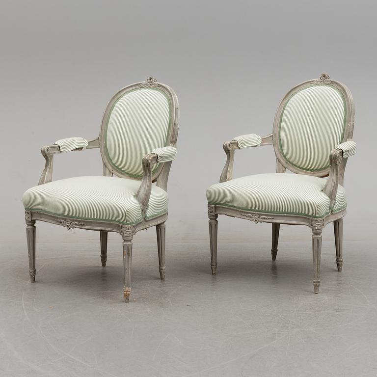 A pair of Gustavian style armchairs, 20th century.