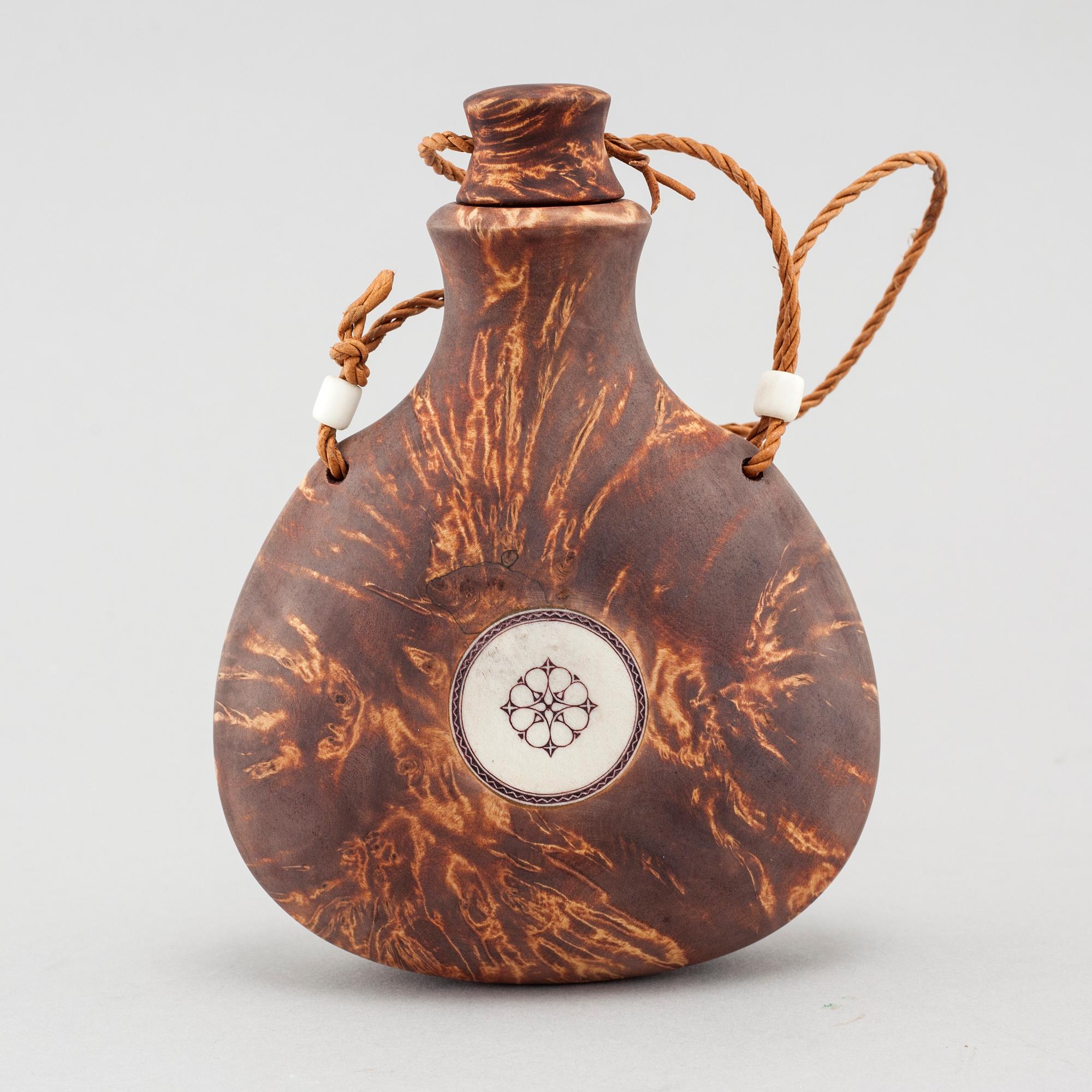 A flask by Roger Saitton, signed RS and dated 2008.