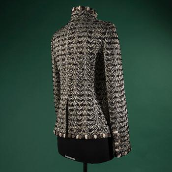 A jacket by CHANEL, in size 42(FR).