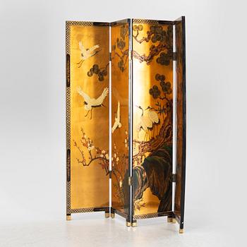 A Chinese lacquer folding screen, 20th century.