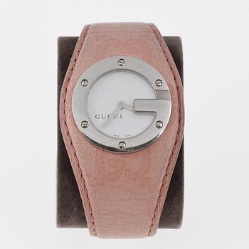 A Gucci women wrist-watch.