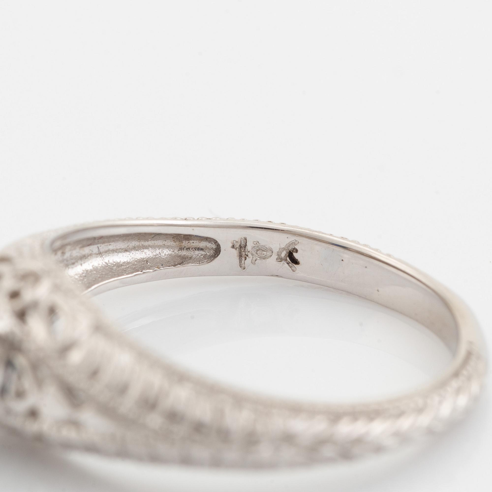 White gold and sapphire ring.