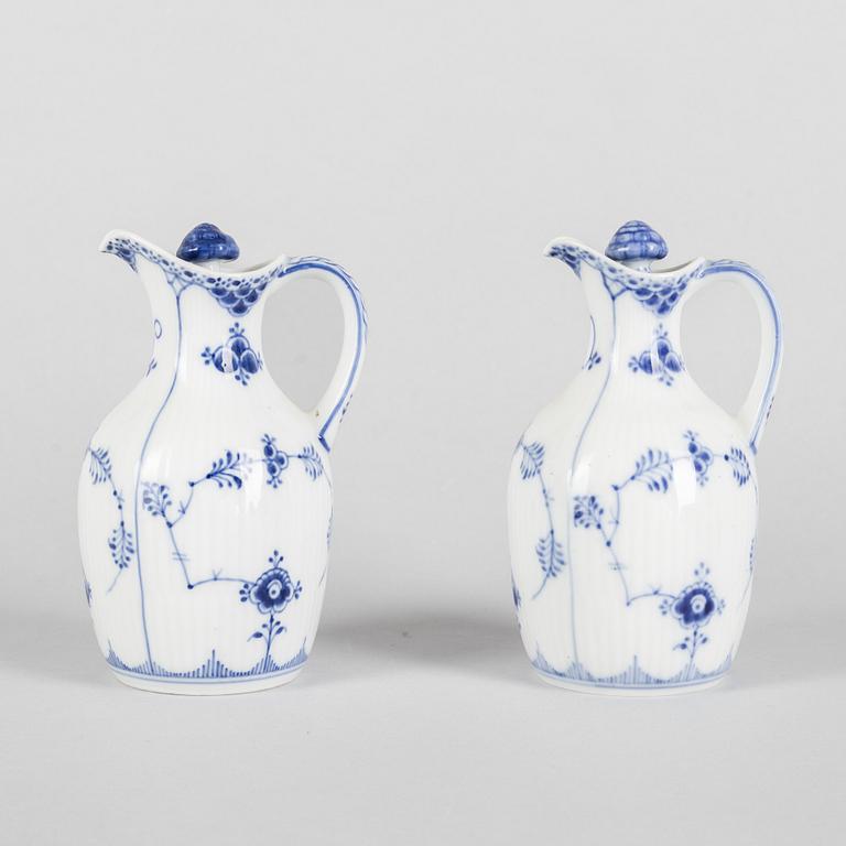 A pair of 'Blue Fluted' porcelain oil and vinegar pitchers and a tray, Royal Copenhagen, models 1179, 1180 and 1195.