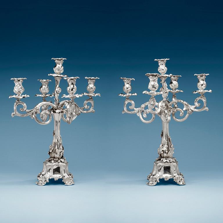 A pair of Swedish mid 19th century silver candelabra, marks of Gustaf Möllenborg-Féron, Stockholm 1856.