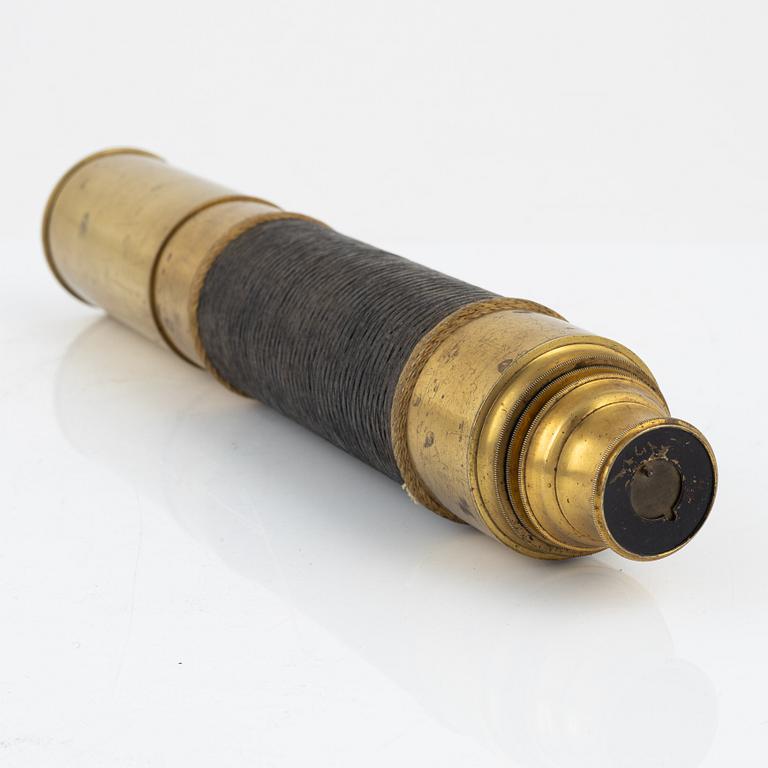 A brass telescope, around 1900.