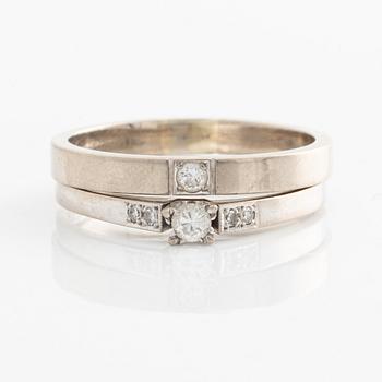 Ringar, 2 st, med briljantslipade diamanter.