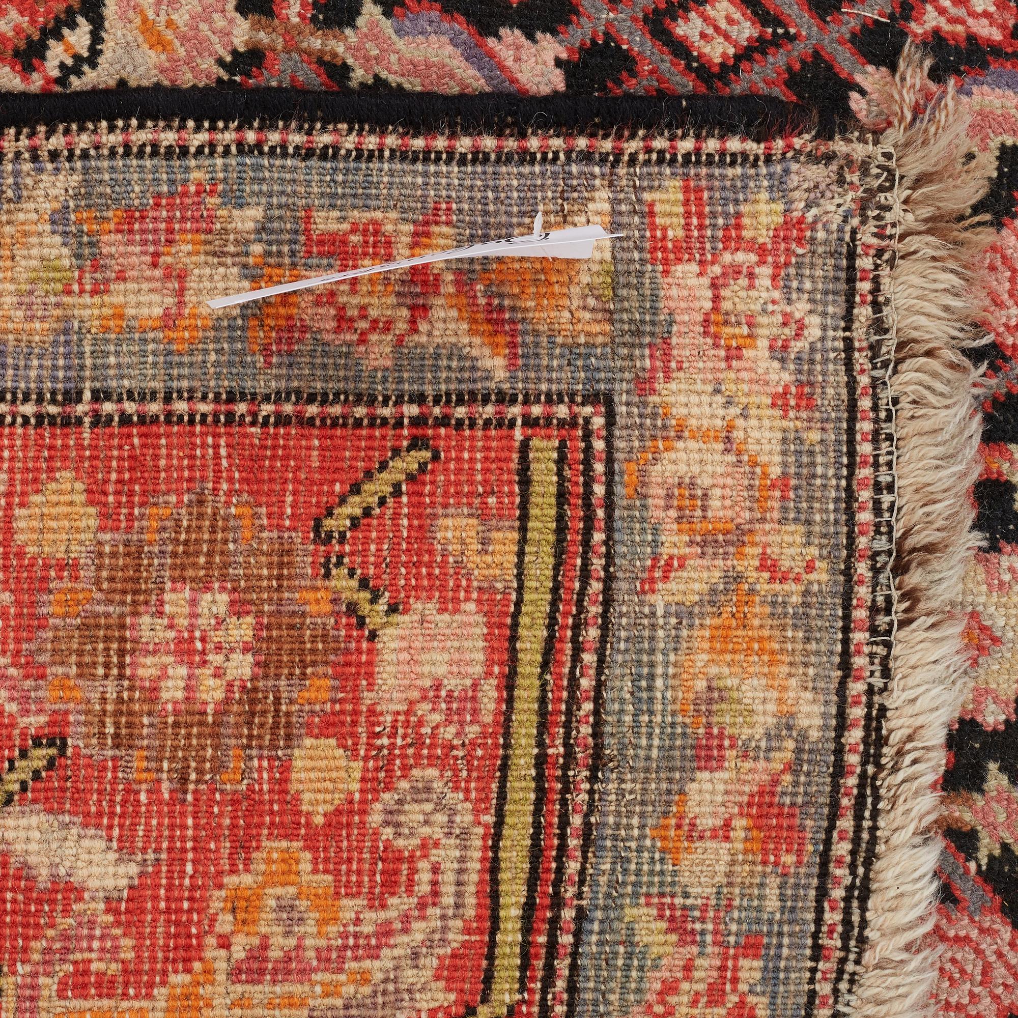 MATTO, an antique Karabakh kelly, ca 575,5 x 209 cm.