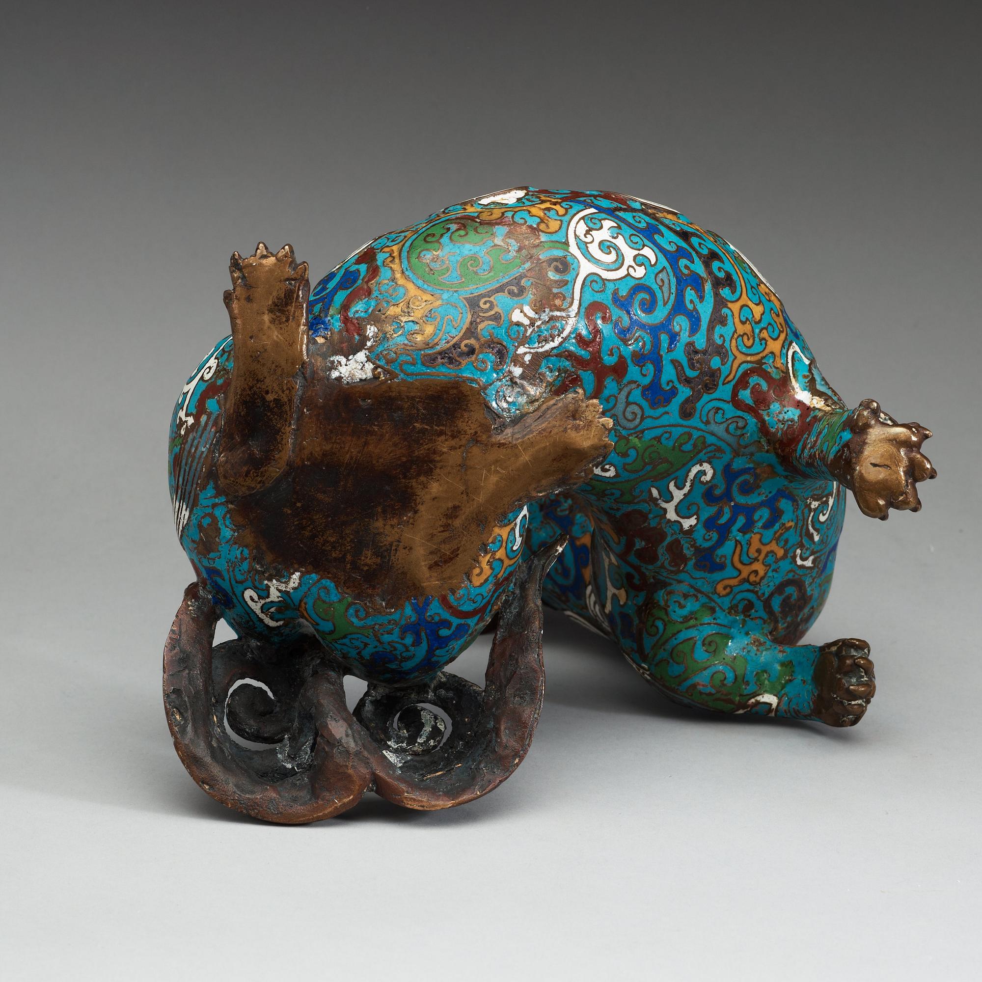 A cloisonné figure of a Buddhist Lion, Qing dynasty (1644-1912).