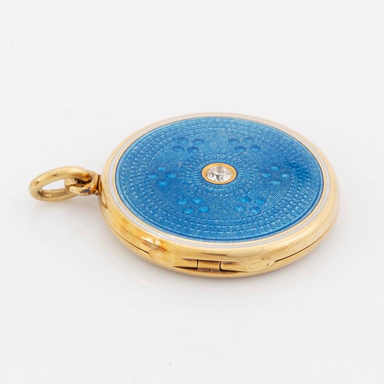 An enamel locket set with an old-cut diamond.