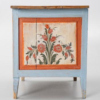 A Swedish folk art polychrome-painted table from Järvsö, Hälsingland, dated 1834.