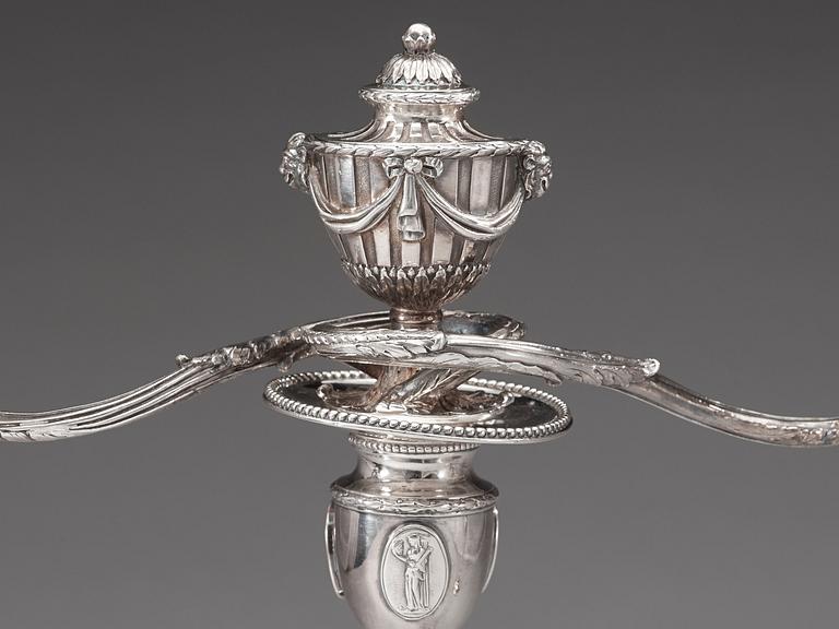 A pair of English 18th century silver candelabras, marks of Henry Hobdell, London 1778.