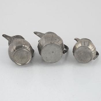 Three Rococo pewter coffee pots, 18th century.