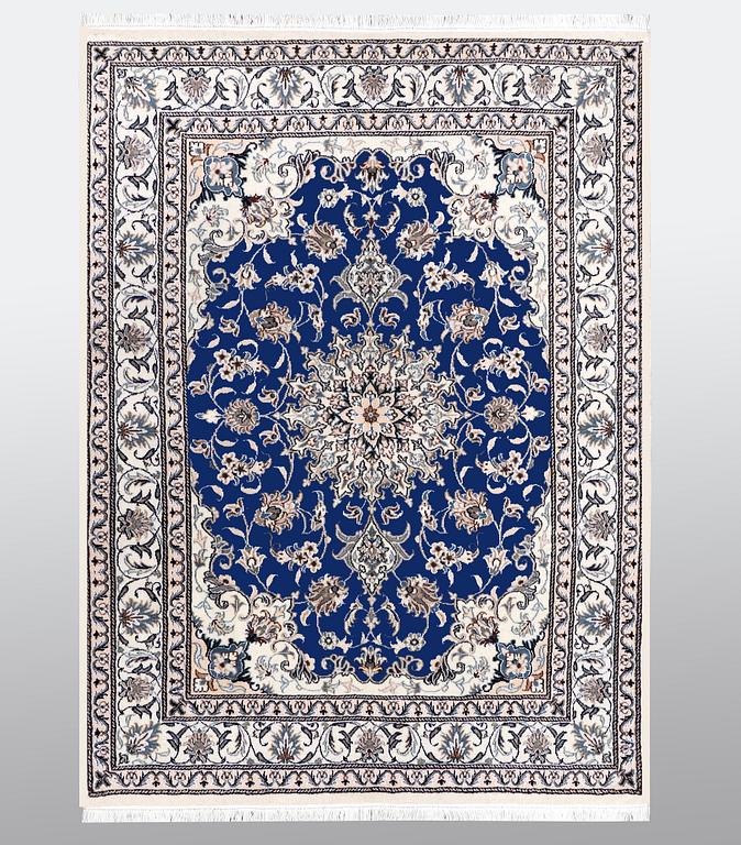 A carpet, Nain, part silk, ca 205 x  152 cm.