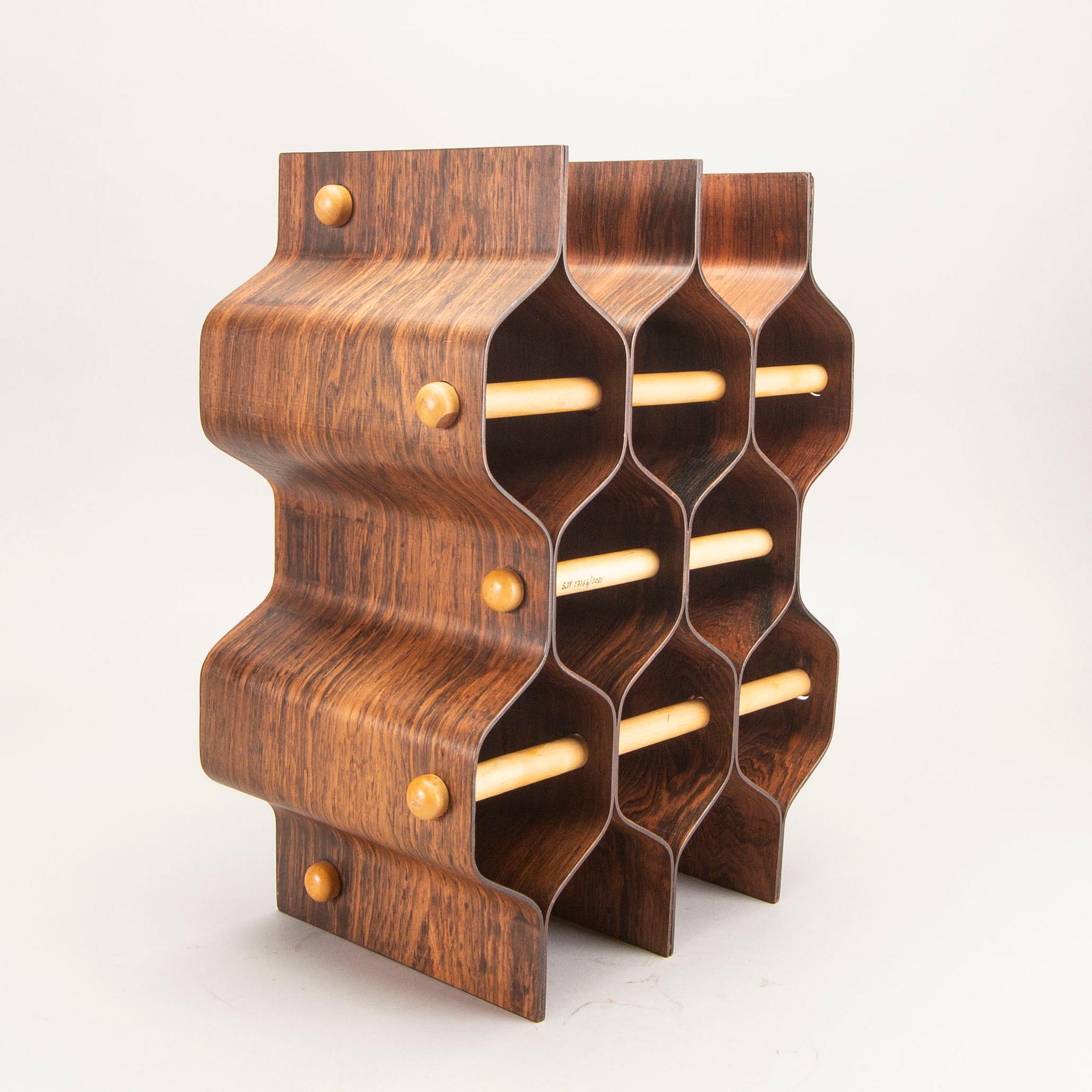 A Torsten johansson jacaranda wine stand for AB Formträ Värnamo 1965.