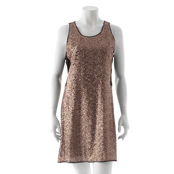 SAND red carpet, a sequin embellished dress.