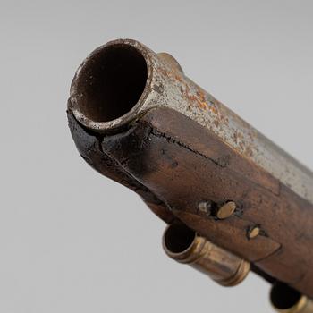 Two British flintlock pistols from around the year 1800.