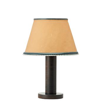 387. A Paul Dupré-Lafon leather table lamp for Hermés, Paris, mid 20thC.