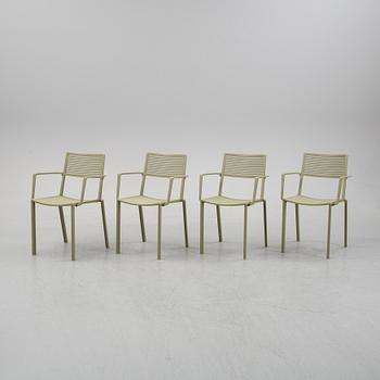 Four 'Easy' aluminum armchairs from FAST furniture.