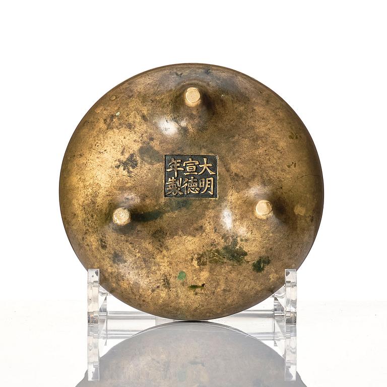 A tripod bronze censer, 17/18th Century with Xuande mark.