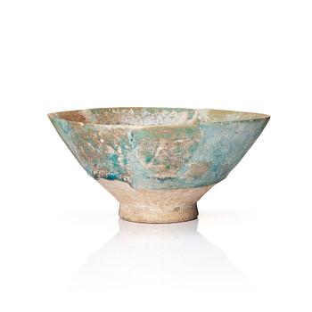 331. A 10-11th century Kashan Turquoise-glazed pottery bowl.