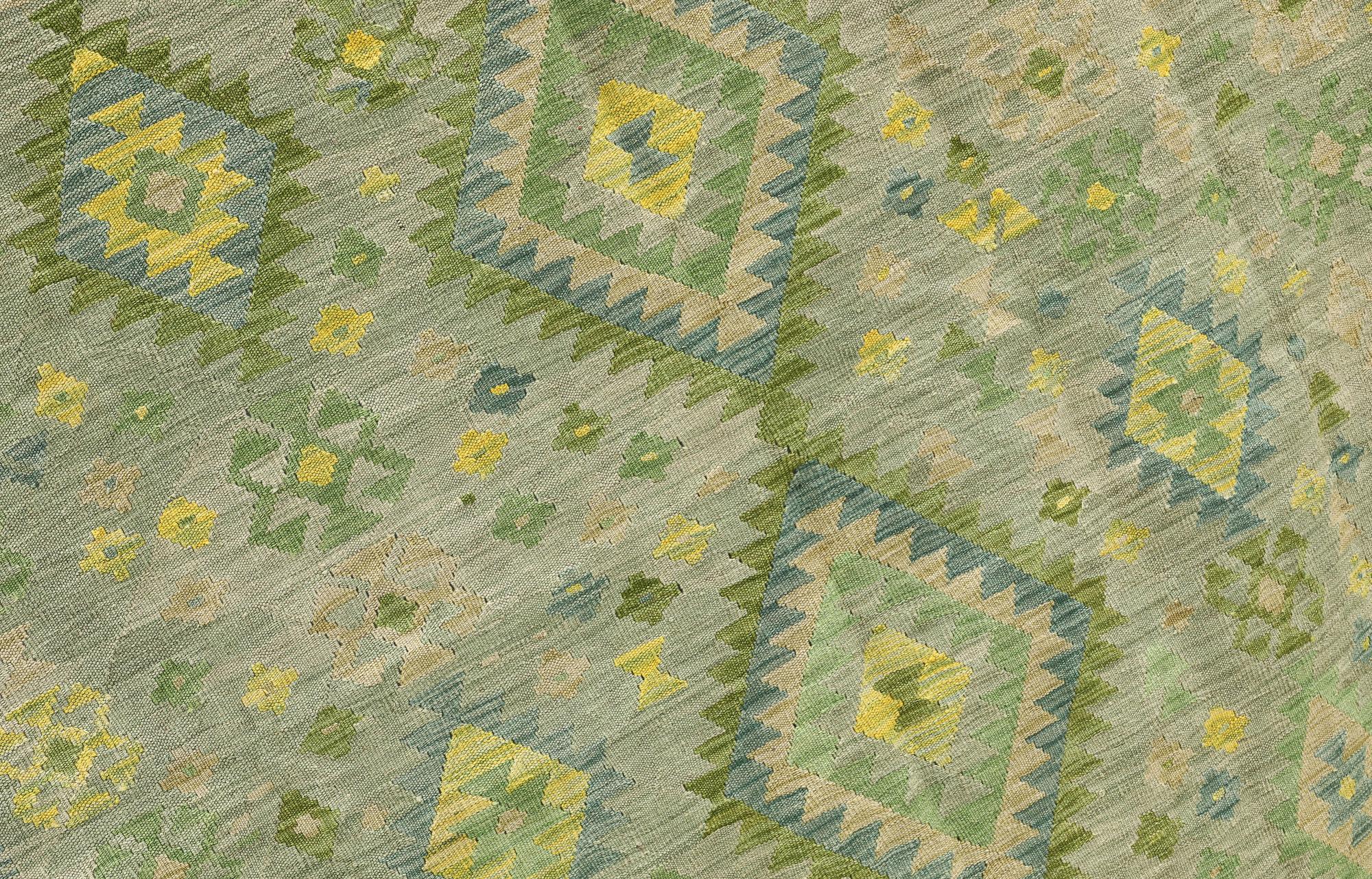 A Kilim carpet, 297 x 200 cm.