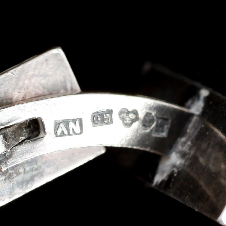 SLIPSNÅL SAMT MANSCHETTKNAPPAR, 1 par, silver, Wiwen Nilsson, 1940. Vikt ca 19 gram.
